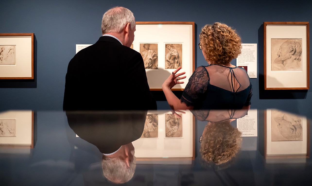 Curator Av van Camp and a Flemish guest at our Bruegel exhibition preview. Photo Hannah Pye / Ashmolean Museum Curator Av van Camp and a Flemish guest at our Bruegel exhibition preview with their backs to the camera looking at the Rubens drawings