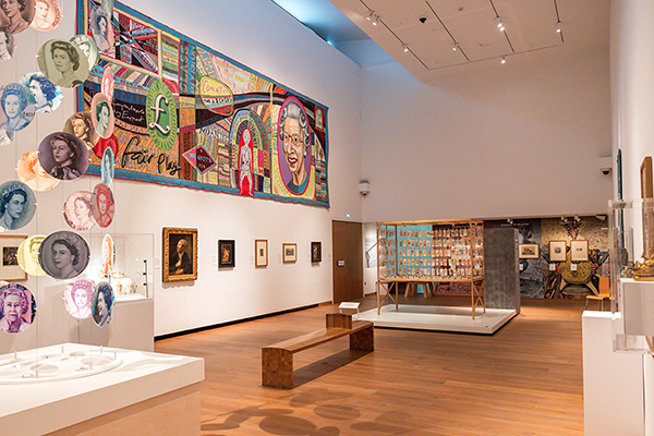 Money Talks gallery image showing the second gallery with Grayson Perry's blanket and Meschac banknotes installation money talks hannah pye 0091 gallery 2 blanket 1200px