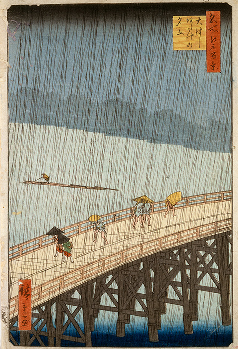 Hiroshige's Evening Shower at Ohashi Bridge, Atake, 1857, depicting people with umbrellas hurrying over the bridge in a summer rainstorm