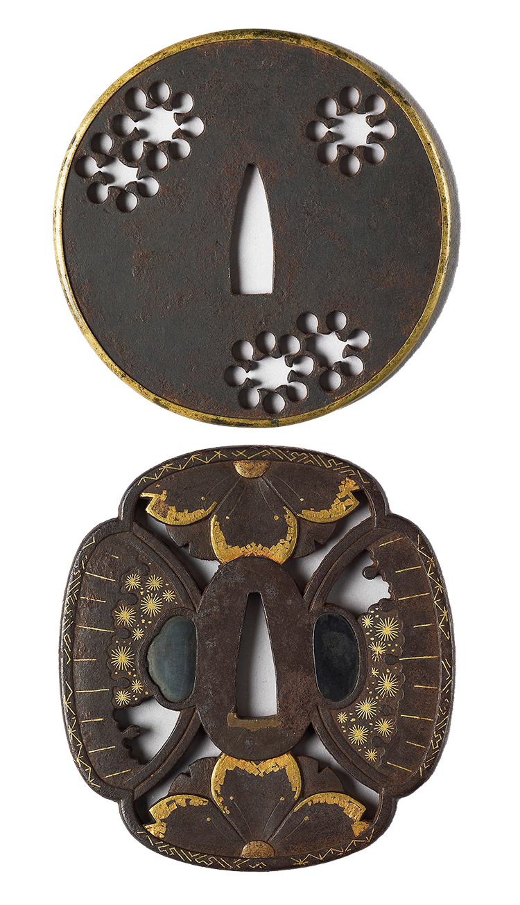 Two tsuba sword guards wth snowflake decorations Two tsuba sword guards wth snowflake decorations