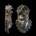 Front and side view of an ornate bronze mask from Benin