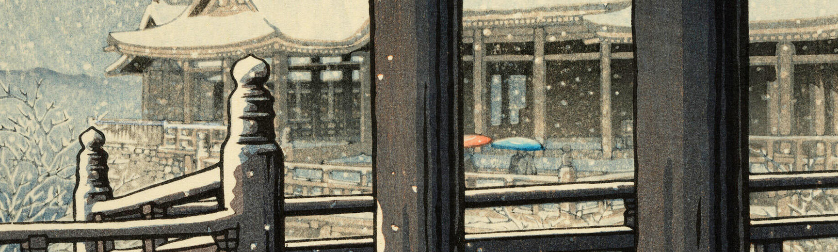 Japanese temple with snow falling