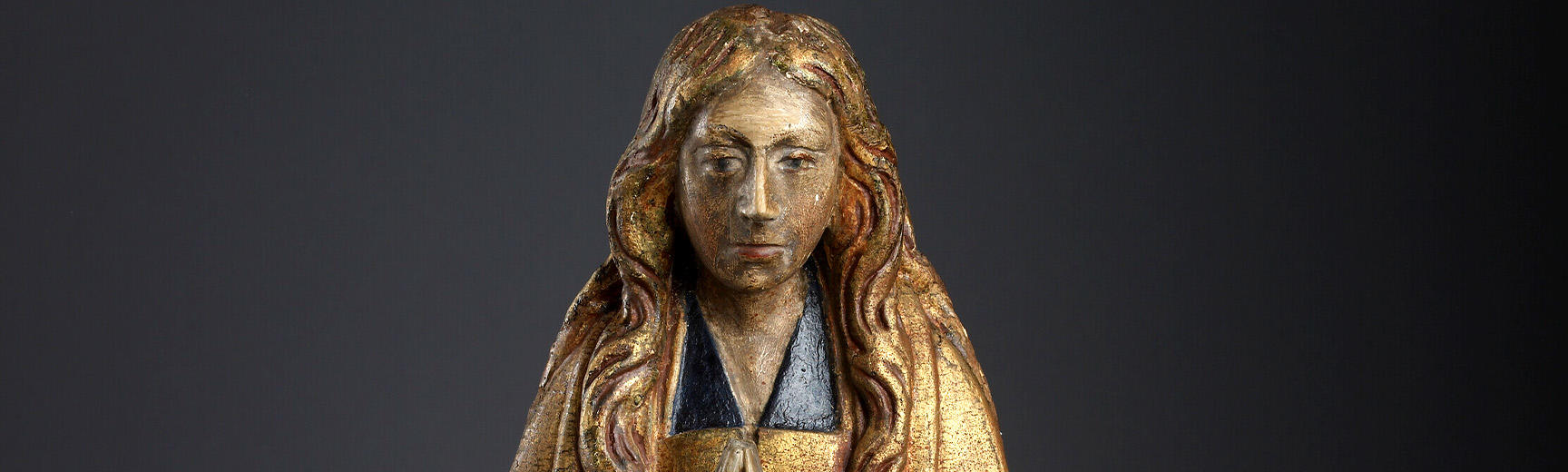 Carved wooden figure representing the Virgin Mary