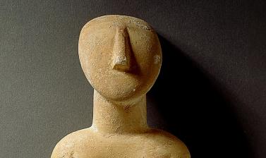 Cycladic figure.