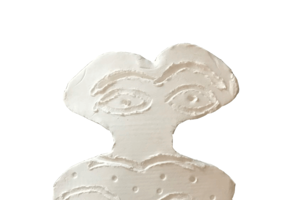 Light coloured stone or clay carving of an Eye Idol called Layan