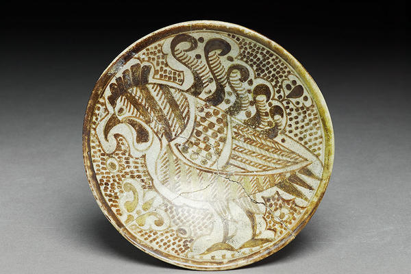 Earthenware with painting in lustre of a cockerel on saucer, Iraq, 10th century