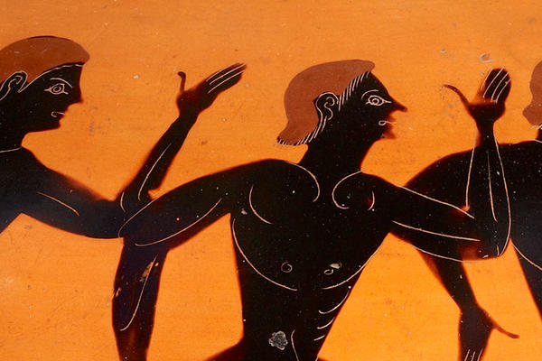 Runners on an orange ancient Greek pot