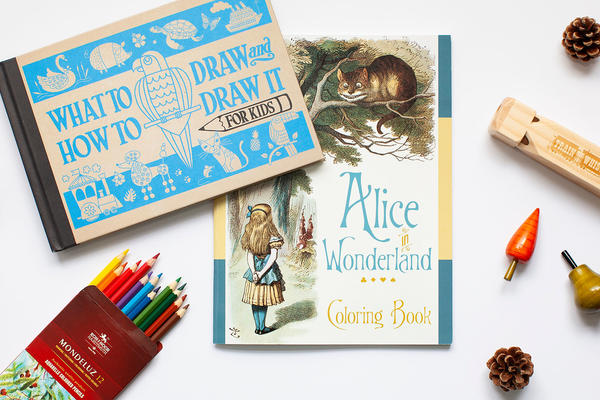 A selection of gifts for children, including books and colouring pencils