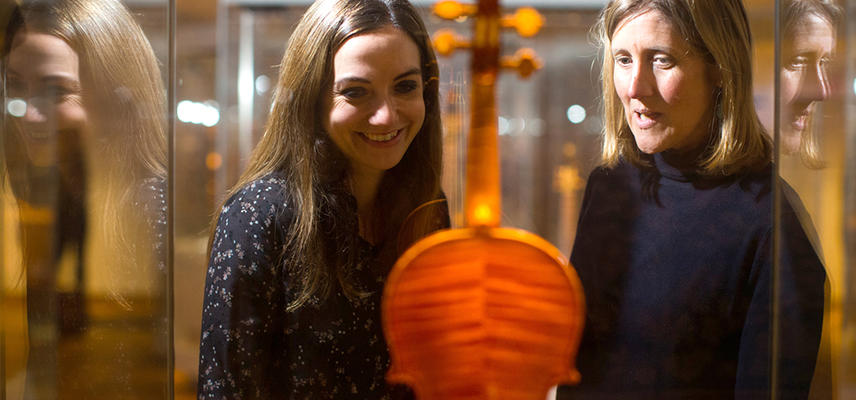 Visitors enjoying the musical instruments in the galleries