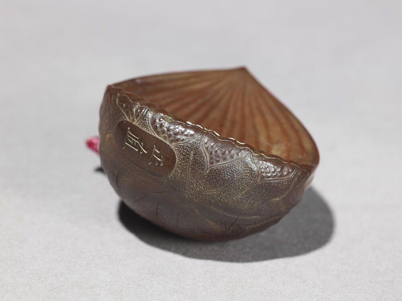 Detail of a Japanese Wooden Netsuke in the form of a Chestnut