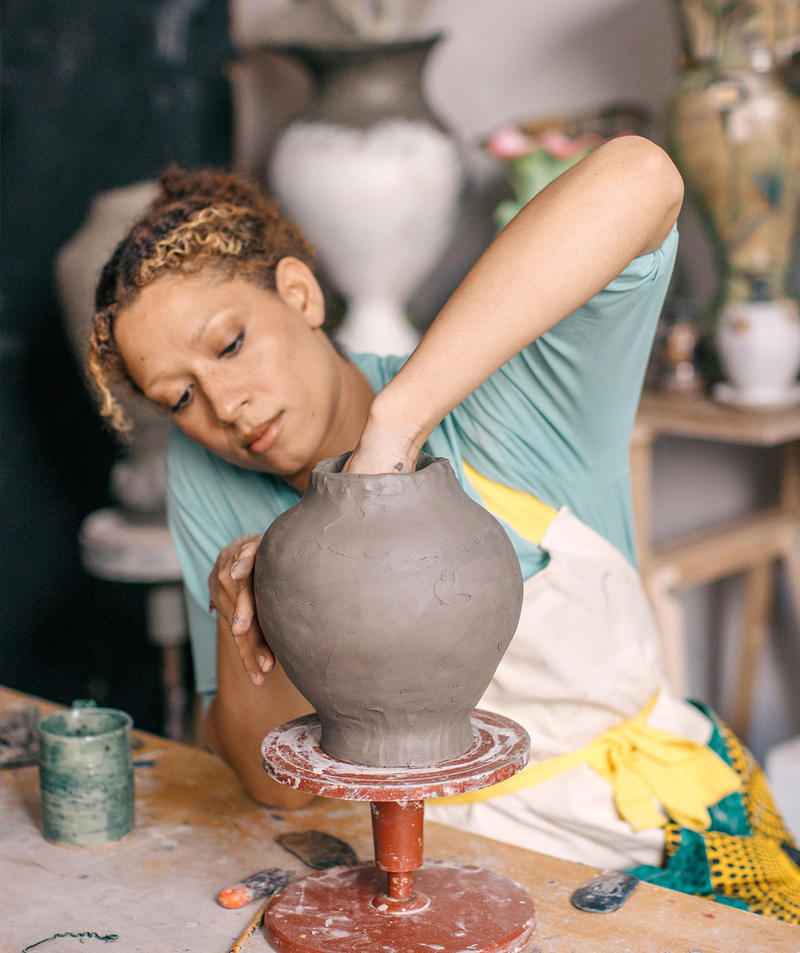 Freya Branble-Carter from Clay Live demonstrating turning a clay pot