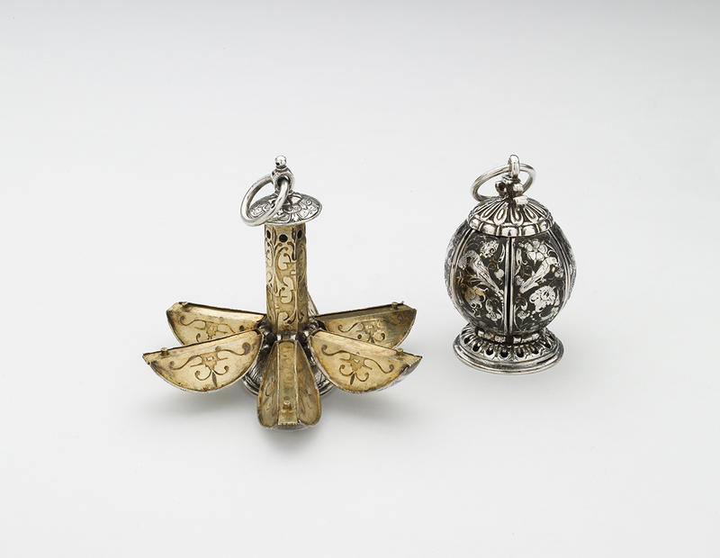 Two silver and god spherical pomanders, one is open into segments
