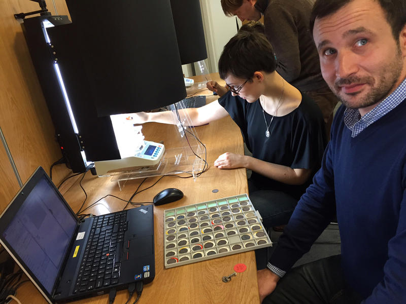 Experts at work digitising the coin room