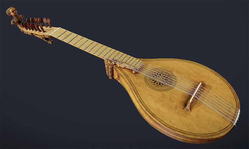 Renaissance musical instrument with carved tuning head