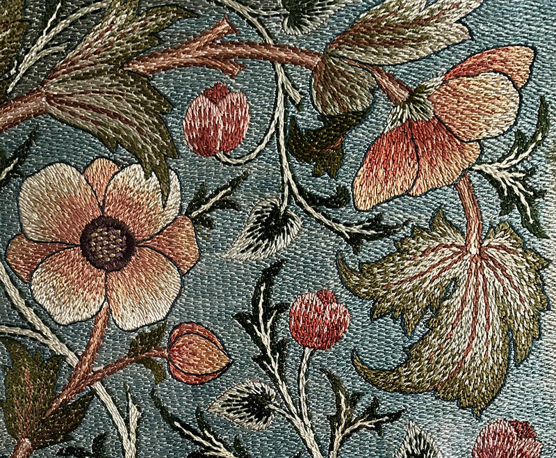 Anemone screen panel, designed by John Henry Dearle, c.1885–90, stitched by May Morris, polychrome silks on Manchester cloth © Private collection Pretty anemone embroidered screen panel in pinks, oranges, blues and greens, stitched by May Morris