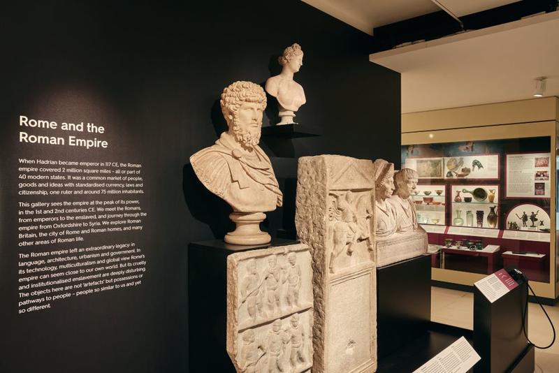 Entrance displays of busts and marble reliefs inside the new Rome galleries