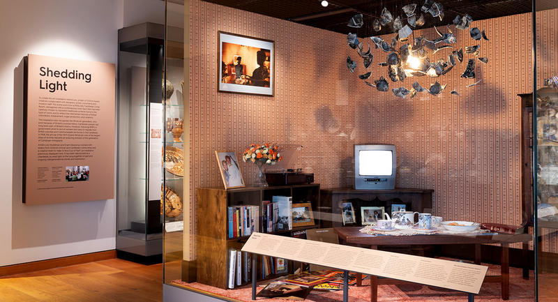 1950s-60s Caribbean Living Room display with china, tv, books and records in the European Ceramics Gallery