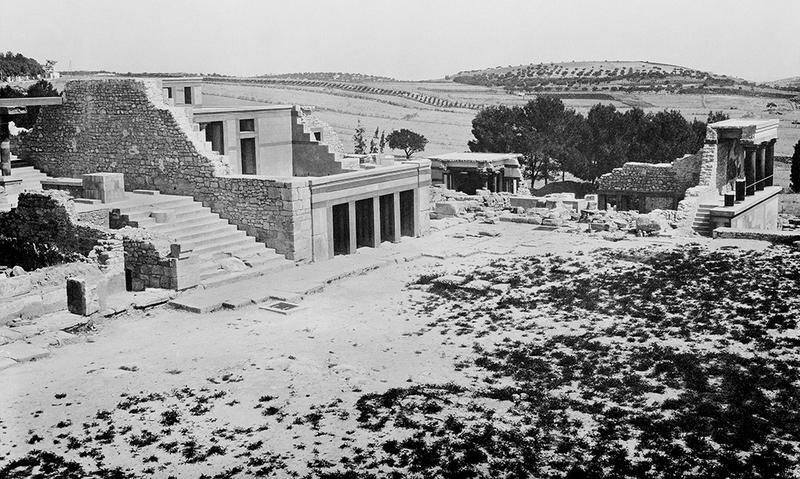 Black and white photo of the rebuilding work at Knossos and the landscape