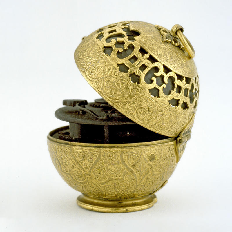 An ornate golden, metallic, spherical ball with a clock face on the front