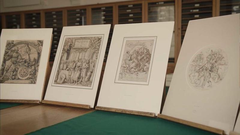 Four artworks propped up on a table in the Ashmolean's Western Art Print Room