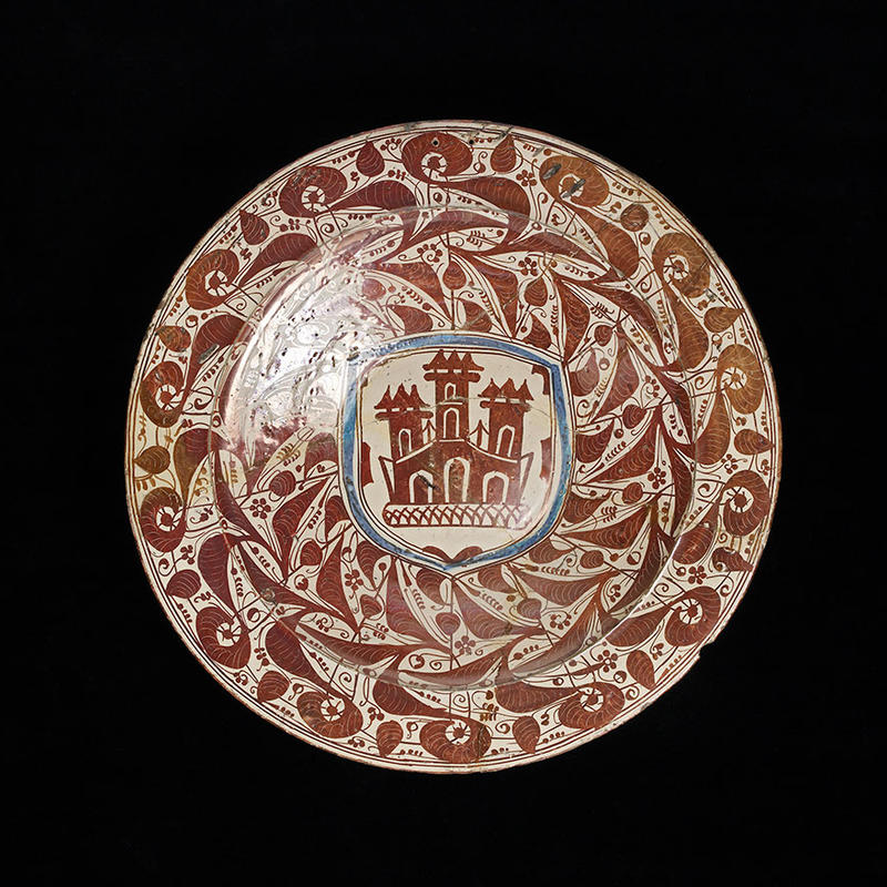 Dish with Arms of Castile, Christian Kingdom of Castille, decorative tin-glazed earthenware lustred