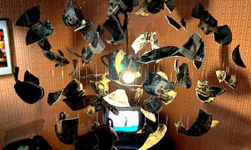Detail of the chandelier in the Shedding Light / Nice Cup of Tea installation Detail of the broken china chandelier display