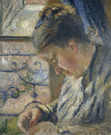 Camille Pissarro's tender oil portrait of his wife, Julie, sewing beside a window. She bows her head in concentration