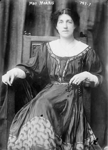 May Morris archive photo taken c 1909 for her American lecture tour © Library of Congress, Rare Book & Special Collections Division Black and white photo of May Morris sitting on a chair wearing a flowing dress, taken about 1909 for her American lecture tour