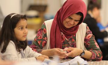 Family doing crafts at the Museum