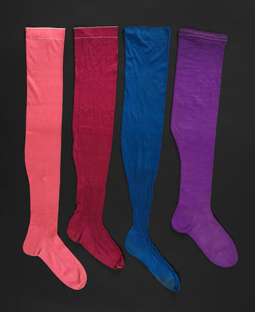 Silk and wool pink, red, blue and purple stockings, 1862 Silk and wool pink, red, blue and purple stockings,1862 © Fashion Museum, Bath
