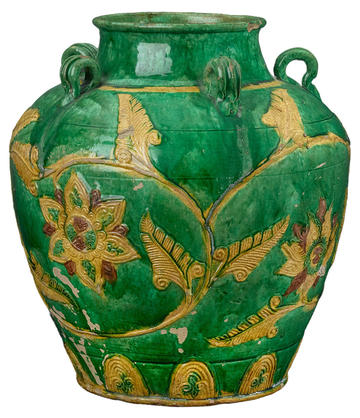 A green and brightly coloured storage jar from the Ming dynasty discovered by John Tradescant