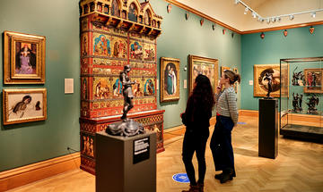 Visitors in the Pre-Raphaelites gallery in 2025