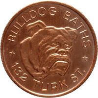 Bulldog Baths Token, copper-gilt aluminium - HCR115360 A copper colour token which shows a the image of a bulldog in the centre. 'Bulldog Baths * 132 Turk St.' is written around the image of the bulldog