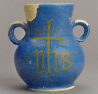 Tin-glazed vase with IHS trigram, found during Broad Street excavations, 1930s Tin-glazed vase with IHS trigram, found during Broad Street excavations, 1930s